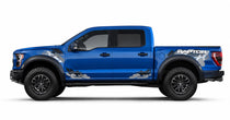 Ford F-150 Raptor Camo Decal Kit - Blue truck with military camo graphics on front guards and rear bed sides