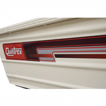 Close-up of the red and dark Quintrex stripe kit on the cream hull
