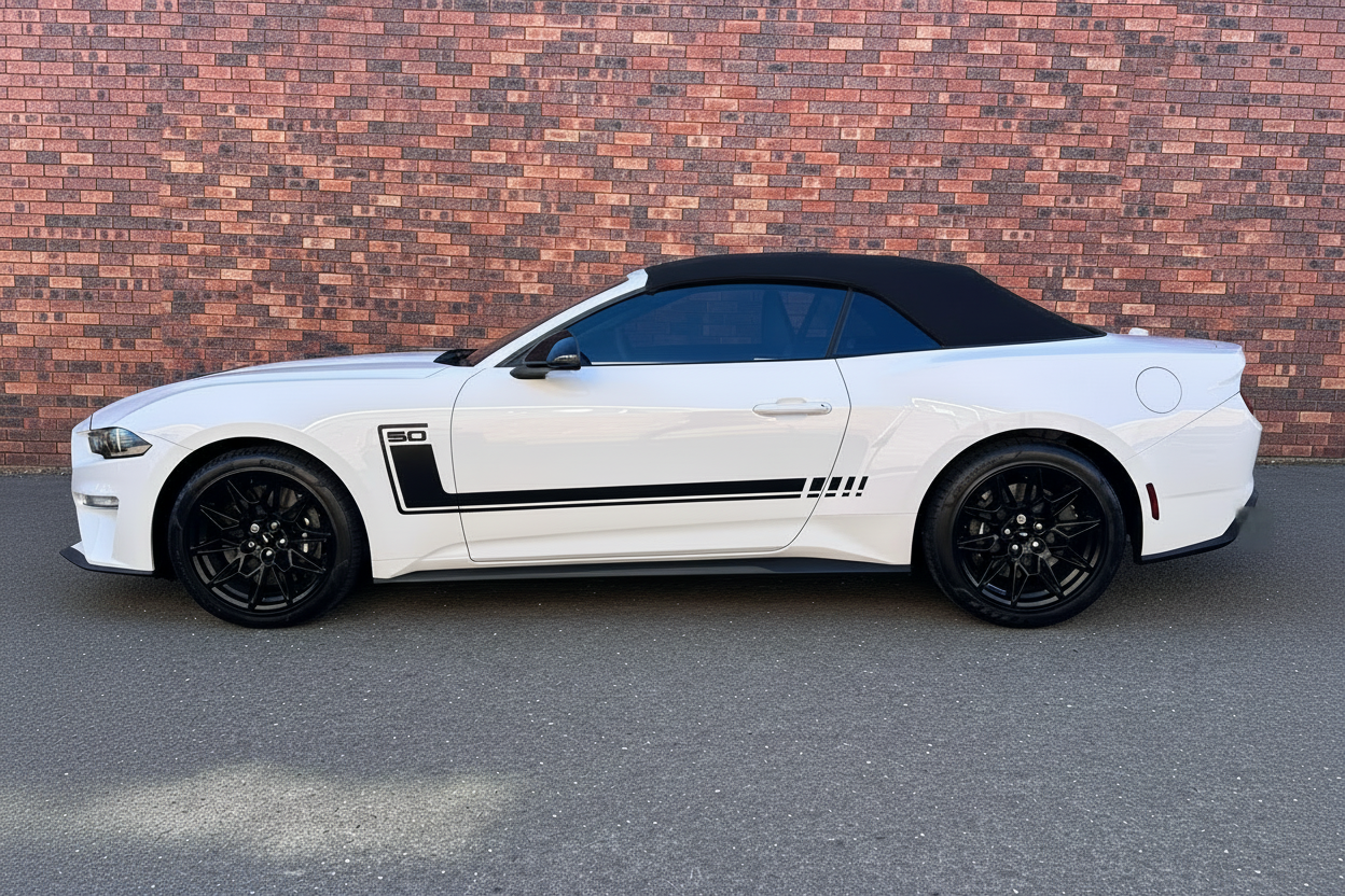 2025 Mustang GT Convertible with precision-cut stripe kit and blurred number plate on a transparent background