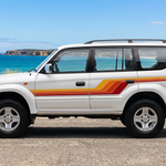 Prado with a coastal background