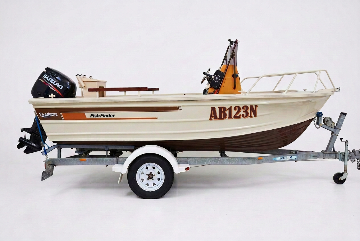Straight side view of the boat with black Fish Finder lettering