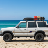 White 4x4 on Beach