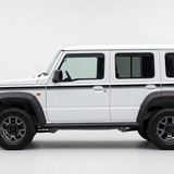 White five-door Jimny with grey, dark grey and black side stripes