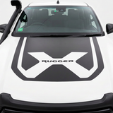 White Hilux bonnet decal with a white centre X and black RUGGED lettering