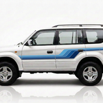 White Prado with blue stripes and detailed rear sweep