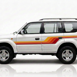 White Prado with the same detailed stripe style in yellow, orange and deep red