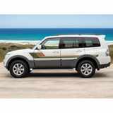 White SUV with retro stripe in an Australian coastal setting