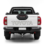 White Toyota Hilux with Toyota and Rugged X tailgate graphics